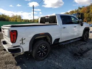 2022 GMC Sierra 3500HD Denali z VIN 1GT49WEYXNF282368, wystawiony jako Copart lot #76686364 z przebiegiem 63 832 mil mil oraz Szkody całkowita. Historia ofert i sprzedaży dostępna na DreamBid. Obrazek 3.
