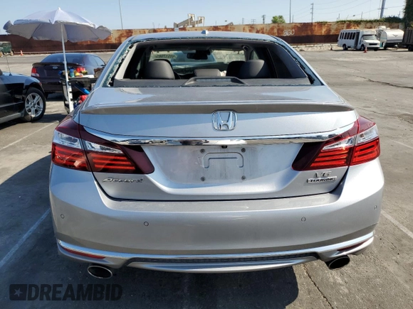 2017 Honda Accord Touring with VIN 1HGCR3F91HA016581, listed as a Copart auction lot 60517085 with 99,182 mi miles and Salvage title. Bid and sale history available at DreamBid. Image 6.
