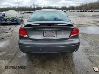 2004 Ford Taurus SES with VIN 1FAFP55U34A113140, listed as a Copart auction lot 53606615 with 99,800 mi miles and Salvage Title. Bid and sale history available at DreamBid. Image 6.