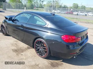 2015 BMW 4 Series 428i xDrive with VIN WBA3N9C59FK248249, listed as a IAAI auction lot 42140141 with 106,916 mi miles and . Bid and sale history available at DreamBid. Image 3.
