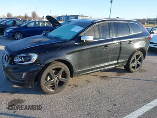 2014 Volvo XC60 R-Design Premier Plus z VIN YV4902DZ4E2537605, wystawiony jako IAAI lot #41126501 z przebiegiem 119 644 mil mil oraz . Historia ofert i sprzedaży dostępna na DreamBid. Obrazek 14.