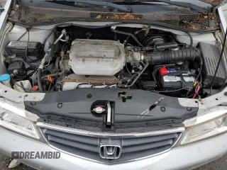 2003 Honda Odyssey EX z VIN 5FNRL18603B008148, wystawiony jako Copart lot #60669825 z przebiegiem 128 115 mil mil oraz Czysty tytuł • Clean title. Historia ofert i sprzedaży dostępna na DreamBid. Obrazek 12.