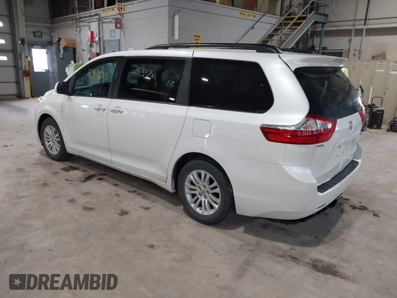 2015 Toyota Sienna XLE with VIN 5TDYK3DC8FS598525, listed as a IAAI auction lot 41918825 with 128,557 mi miles. Bid and sale history available at carsss.com. Image 3.