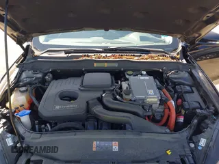 2013 Ford Fusion Titanium Hybrid with VIN 3FA6P0RU2DR288773, listed as a IAAI auction lot 41803708 with 85,868 mi miles and . Bid and sale history available at DreamBid. Image 10.