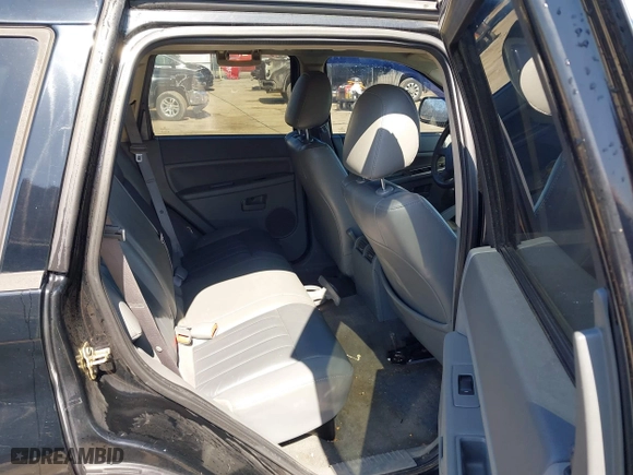 2007 Jeep Grand Cherokee Laredo with VIN 1J8GR48K67C523705, listed as a IAAI auction lot 41774281 with 215,572 mi miles. Bid and sale history available at carsss.com. Image 8.