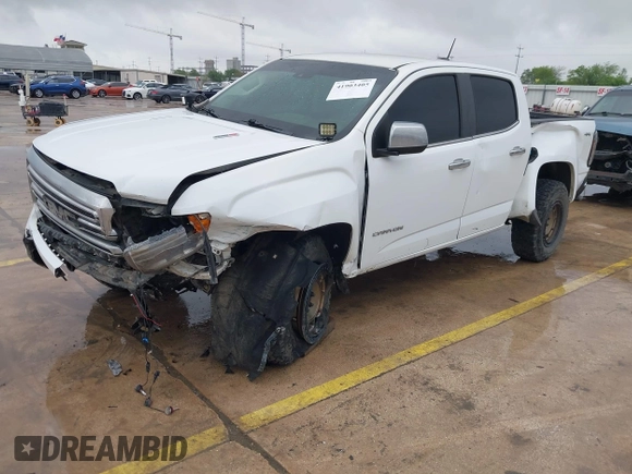 2018 GMC Canyon 4WD SLT with VIN 1GTP6DE18J1111056, listed as a IAAI auction lot 41903405 with 99,280 mi miles. Bid and sale history available at carsss.com. Image 2.