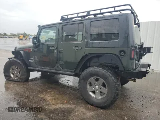 2012 Jeep Wrangler Unlimited Sport with VIN 1C4HJWDG8CL122067, listed as a Copart auction lot 58549805 with 124,658 mi miles and Clean title. Bid and sale history available at DreamBid. Image 2.