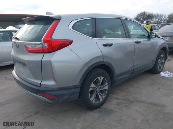 2018 Honda CR-V LX with VIN 2HKRW6H37JH213670, listed as a IAAI auction lot 41596374 with 96,105 mi miles. Bid and sale history available at carsss.com. Image 4.