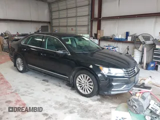 2016 Volkswagen Passat SE z VIN 1VWBT7A38GC010301, wystawiony jako IAAI lot #42316812 z przebiegiem 154 618 mil mil oraz . Historia ofert i sprzedaży dostępna na DreamBid. Obrazek 1.