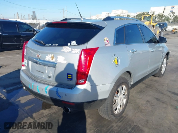2013 Cadillac SRX Luxury Collection with VIN 3GYFNGE36DS591211, listed as a IAAI auction lot 41319932 with 174,059 mi miles. Bid and sale history available at carsss.com. Image 4.