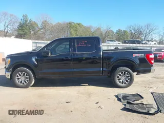 2021 Ford F-150 XL with VIN 1FTFW1E58MFA84347, listed as a IAAI auction lot 41402387 with 133,150 mi miles. Bid and sale history available at carsss.com. Image 14.