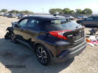 2018 Toyota C-HR XLE z VIN NMTKHMBX6JR062387, wystawiony jako Copart lot #56206091 z przebiegiem 47 001 mil mil oraz Szkoda całkowita • Salvage title. Historia ofert i sprzedaży dostępna na DreamBid. Obrazek 3.