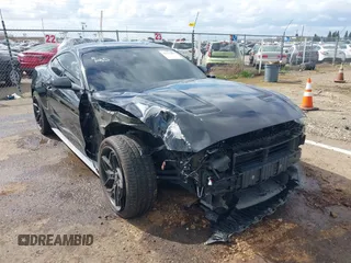 2021 Ford Mustang EcoBoost with VIN 1FA6P8TH2M5155461, listed as a IAAI auction lot 41933697 with 65,034 mi miles. Bid and sale history available at carsss.com. Image 6.