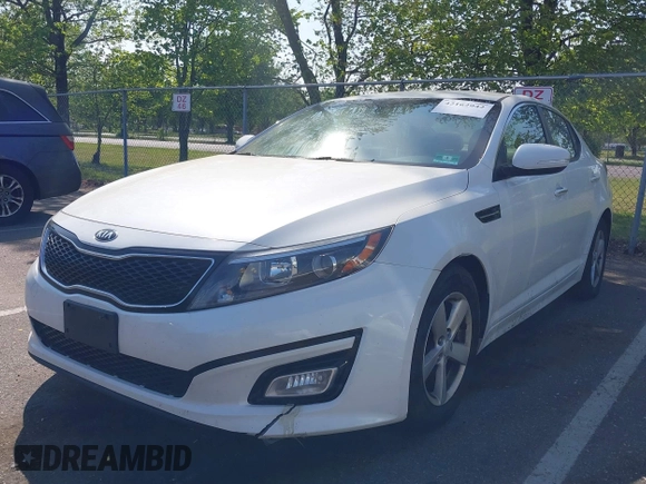 2015 Kia Optima LX with VIN KNAGM4A76F5663782, listed as a IAAI auction lot 42162942 with 128,321 mi miles. Bid and sale history available at carsss.com. Image 2.