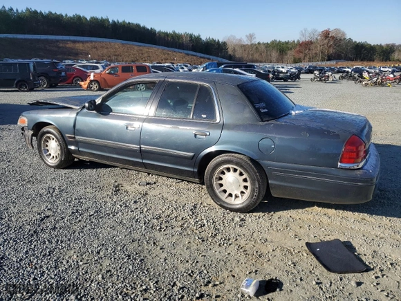 1999 Ford Crown Victoria LX with VIN 2FAFP74W9XX137078, listed as a Copart auction lot 82999554 with 166,132 mi miles and Salvage Title. Bid and sale history available at carsss.com. Image 2.