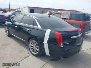 2013 Cadillac XTS Luxury with VIN 2G61R5S34D9135026, listed as a IAAI auction lot 41686214 with 92,732 mi miles. Bid and sale history available at carsss.com. Image 3.