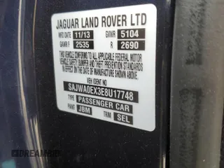 2014 Jaguar XF SC with VIN SAJWA0EX3E8U17748, listed as a Copart auction lot 52010435 with 84,685 mi miles and Salvage Title. Bid and sale history available at DreamBid. Image 12.