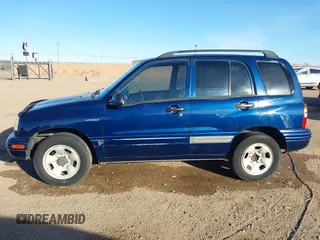2003 Suzuki Vitara z VIN 2S3TE52V436101091, wystawiony jako IAAI lot #41472279 z przebiegiem 163 429 mil mil oraz . Historia ofert i sprzedaży dostępna na DreamBid. Obrazek 14.