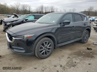 2017 Mazda CX-5 Grand Touring with VIN JM3KFBDL7H0204658, listed as a Copart auction lot 54007165 with 154,546 mi miles and Salvage Title. Bid and sale history available at carsss.com. Image 1.