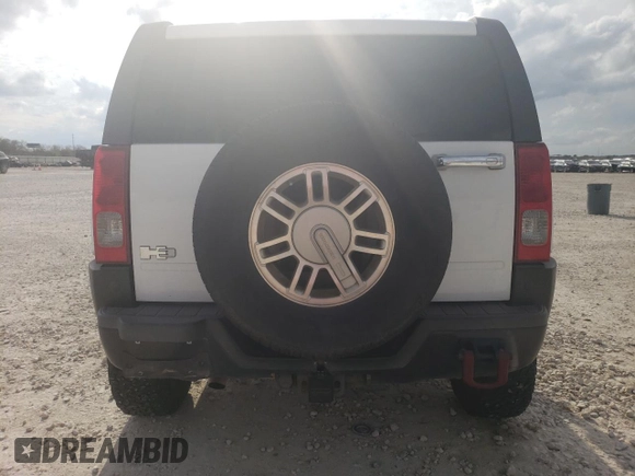 2007 Hummer H3 SUV with VIN 5GTDN13E278167626, listed as a Copart auction lot 86366074 with 128,668 mi miles and Salvage Title. Bid and sale history available at DreamBid. Image 6.