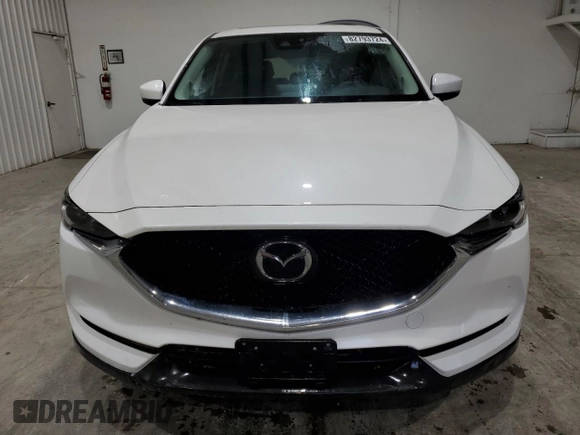 2021 Mazda CX-5 Grand Touring with VIN JM3KFBDM4M1344602, listed as a Copart auction lot 82793724 with 69,322 mi miles and Salvage Title. Bid and sale history available at carsss.com. Image 5.