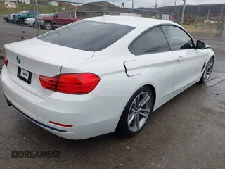2014 BMW 4 Series 428i with VIN WBA3N3C58EF712202, listed as a IAAI auction lot 41843517 with 90,958 mi miles and . Bid and sale history available at DreamBid. Image 4.