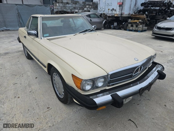 1987 Mercedes-Benz 560 Series 560SL with VIN WDBBA48D5HA061899, listed as a Copart auction lot 76554184 with NaN miles and Salvage Title. Bid and sale history available at carsss.com. Image 1.