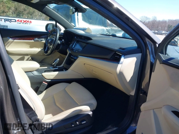 2019 Cadillac XT5 Premium Luxury FWD with VIN 1GYKNERS7KZ145993, listed as a IAAI auction lot 41619112 with 81,435 mi miles and . Bid and sale history available at DreamBid. Image 5.