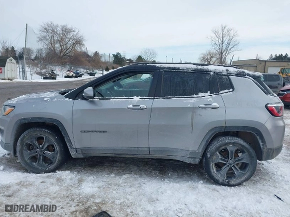 2019 Jeep Compass Latitude with VIN 3C4NJDBB5KT657245, listed as a IAAI auction lot 41403429 with 80,296 mi miles. Bid and sale history available at carsss.com. Image 14.
