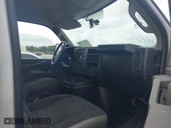 2019 Chevrolet Express Cargo Van with VIN 1GCWGAFG5K1254736, listed as a IAAI auction lot 41880050 with 136,132 mi miles. Bid and sale history available at carsss.com. Image 5.