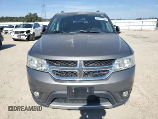 2012 Dodge Journey SXT z VIN 3C4PDDBG7CT300520, wystawiony jako Copart lot #66549985 z przebiegiem 114 954 mil mil oraz Czysty tytuł • Clean title. Historia ofert i sprzedaży dostępna na DreamBid. Obrazek 5.