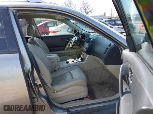 2004 Infiniti FX with VIN JNRBS08W94X404200, listed as a IAAI auction lot 41780095 with 148,802 mi miles. Bid and sale history available at carsss.com. Image 5.