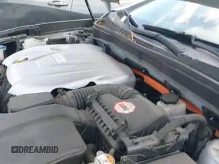 2012 Hyundai Sonata Hybrid z VIN KMHEC4A41CA062216, wystawiony jako IAAI lot #43115615 z przebiegiem 70 347 mil mil oraz . Historia ofert i sprzedaży dostępna na DreamBid. Obrazek 17.