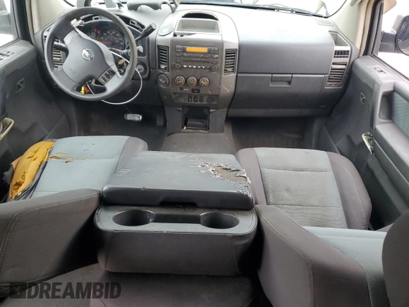 2006 Nissan Titan LE z VIN 1N6BA07B16N557411, wystawiony jako Copart lot #86058634 z przebiegiem 263 198 mil mil oraz Szkody całkowita. Historia ofert i sprzedaży dostępna na DreamBid. Obrazek 8.