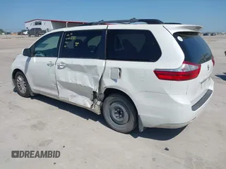 2015 Toyota Sienna XLE with VIN 5TDYK3DCXFS663083, listed as a IAAI auction lot 41967621 with 177,472 mi miles and . Bid and sale history available at DreamBid. Image 3.