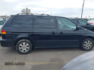 2004 Honda Odyssey EX-L with VIN 5FNRL18914B037976, listed as a IAAI auction lot 41893438 with Not Provided miles and . Bid and sale history available at DreamBid. Image 13.