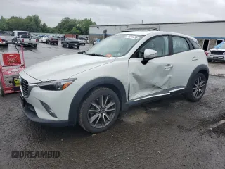 2016 Mazda CX-3 Grand Touring z VIN JM1DKBD77G0105451, wystawiony jako Copart lot #58341495 z przebiegiem 109 525 mil mil oraz Szkody całkowita. Historia ofert i sprzedaży dostępna na DreamBid. Obrazek 1.