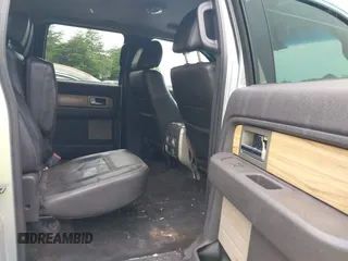 2011 Ford F-150 XLT with VIN 1FTFW1ET7BFA93794, listed as a IAAI auction lot 42185659 with 184,186 mi miles and . Bid and sale history available at carsss.com. Image 8.