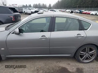2007 Infiniti M Sport z VIN JNKAY01EX7M302565, wystawiony jako IAAI lot #41885272 z przebiegiem 151 745 mil mil oraz . Historia ofert i sprzedaży dostępna na DreamBid. Obrazek 14.