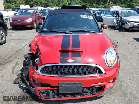 2013 MINI Roadster S z VIN WMWSY3C58DT594039, wystawiony jako Copart lot #65833804 z przebiegiem Nie podano mil oraz Szkody całkowita. Historia ofert i sprzedaży dostępna na DreamBid. Obrazek 5.
