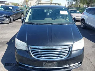 2011 Chrysler Town & Country Touring with VIN 2A4RR5DG2BR702731, listed as a IAAI auction lot 42095661 with 202,968 mi miles and . Bid and sale history available at DreamBid. Image 13.