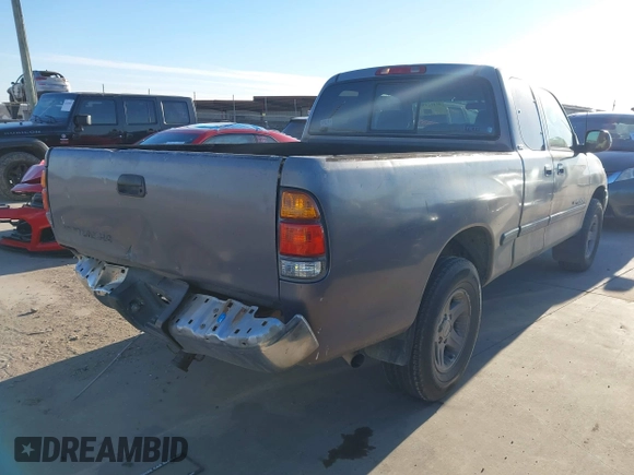 2000 Toyota Tundra SR5 with VIN 5TBRT3413YS019873, listed as a IAAI auction lot 41412497 with 305,472 mi miles and . Bid and sale history available at DreamBid. Image 4.