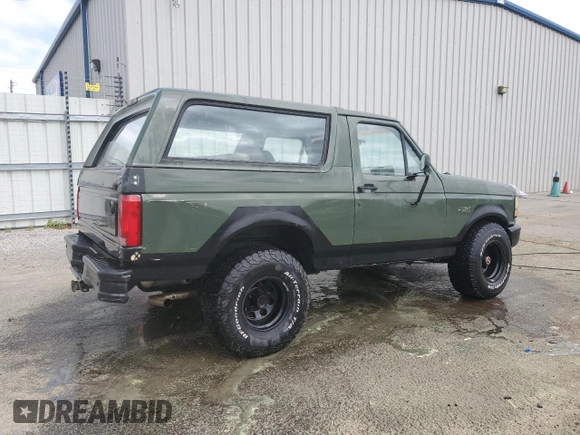 1992 Ford Bronco XL with VIN 1FMEU15N2NLA71562, listed as a Copart auction lot 48827285 with 198,042 mi miles and Salvage Title. Bid and sale history available at carsss.com. Image 3.