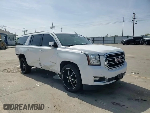 2016 GMC Yukon XL SLT with VIN 1GKS2GKC6GR228033, listed as a Copart auction lot 52450055 with 135,476 mi miles and Salvage Title. Bid and sale history available at DreamBid. Image 12.