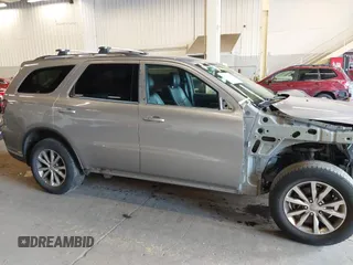 2014 Dodge Durango Limited z VIN 1C4RDJDG1EC976674, wystawiony jako IAAI lot #41745467 z przebiegiem 194 989 mil mil oraz . Historia ofert i sprzedaży dostępna na DreamBid. Obrazek 14.