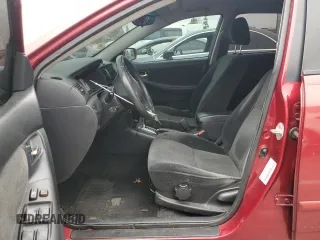2003 Toyota Corolla CE with VIN 1NXBR32E63Z118863, listed as a Copart auction lot 54616565 with 233,229 mi miles and Salvage Title. Bid and sale history available at DreamBid. Image 7.