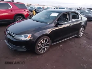 2013 Volkswagen Jetta Hybrid SEL with VIN 3VW637AJ1DM277984, listed as a IAAI auction lot 41450384 with 117,665 mi miles and . Bid and sale history available at DreamBid. Image 2.