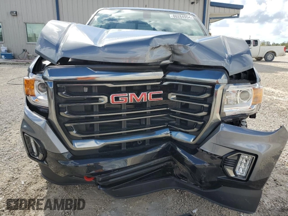 2021 GMC Canyon 4WD AT4 w/Cloth with VIN 1GTG6FEN9M1186142, listed as a Copart auction lot 80284954 with 29,663 mi miles and Non Repairable. Bid and sale history available at carsss.com. Image 5.