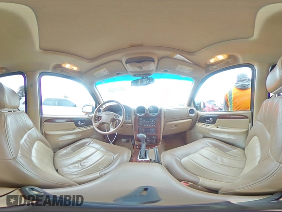 2003 GMC Envoy SLT with VIN 1GKDT13S332293112, listed as a Copart auction lot 43721225 with 139,471 mi miles and Salvage Title. Bid and sale history available at carsss.com. Image 13.