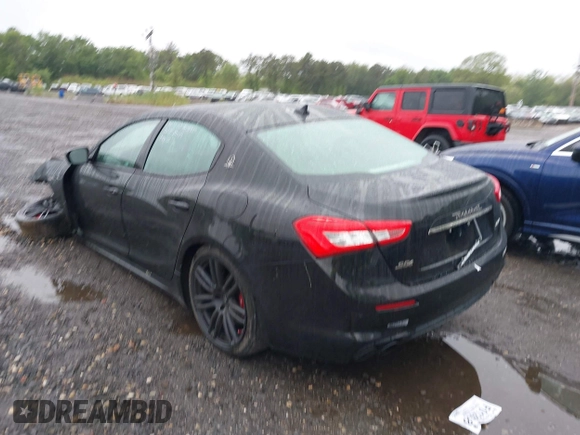2018 Maserati Ghibli S Q4 with VIN ZAM57YTA5J1304811, listed as a IAAI auction lot 42352300 with 52,819 mi miles and . Bid and sale history available at DreamBid. Image 3.